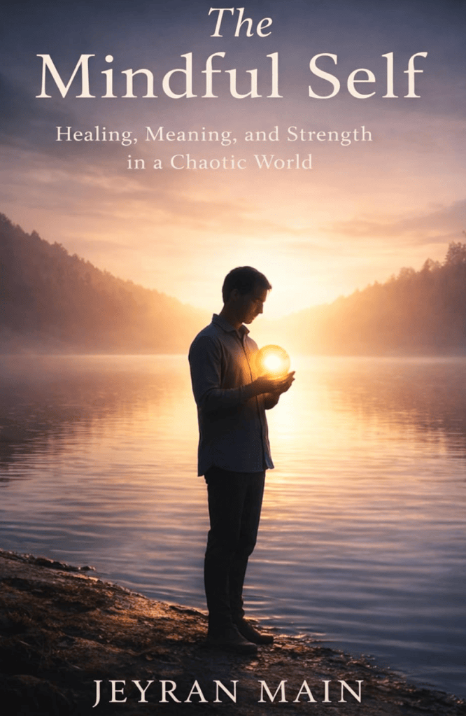 A person standing by a lakeshore at sunset, holding a glowing orb, with the title 'The Mindful Self' and subtitle 'Healing, Meaning, and Strength in a Chaotic World' above them.